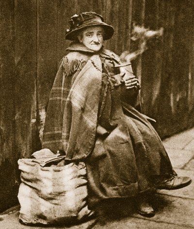 A street lady drinking tea from a typical East End beer can, near Fleet Street by English Photographer